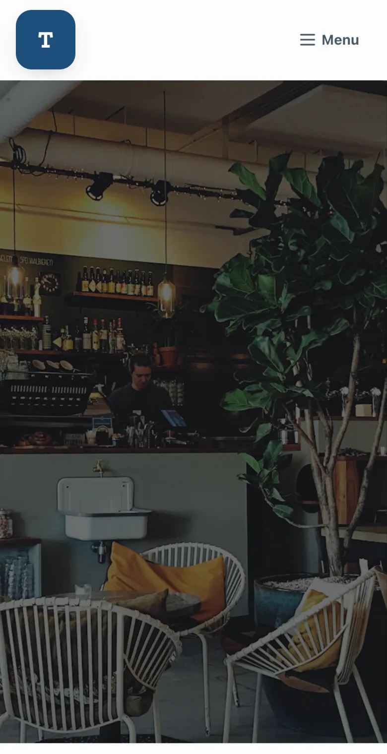 The Quay Café, a demo site's home page on a phone: its name over a photo of the café, a Book online button, the phone number and Open today until 6pm